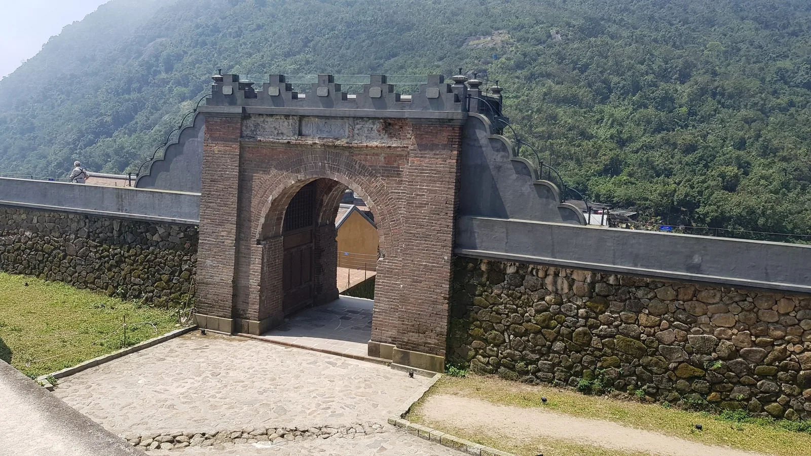 An ancient brick gate stands atop the stone fortifications of Hai Van Pass near Da Nang. An ancient brick gate stands atop the stone fortifications of Hai Van Pass near Da Nang.